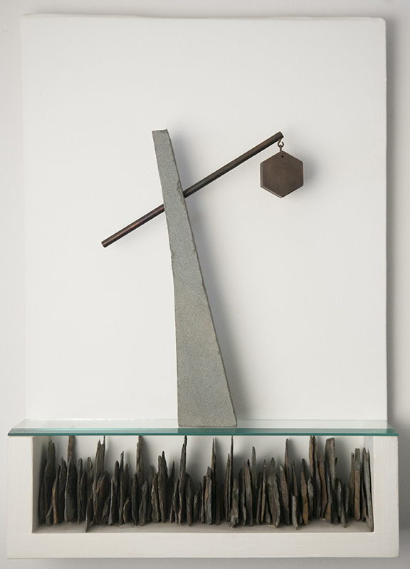 Assemblage with a slanted support, suspended hexagonal form, glass shelf, and vertical fragments